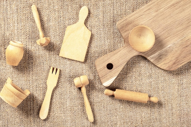 Wooden kitchen utensils on table